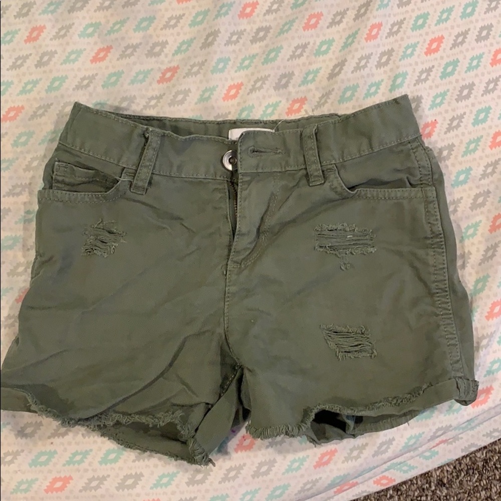 green jean shorts